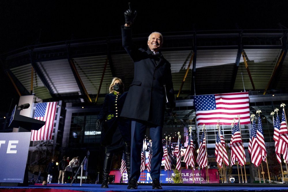 Jill Biden, the wife of Democratic presidential candidate former Vice President Joe Biden, comes on stage as he finishes speaking at a drive-In rally at Heinz Field in Pittsburgh, Monday. (AP-Yonhap)