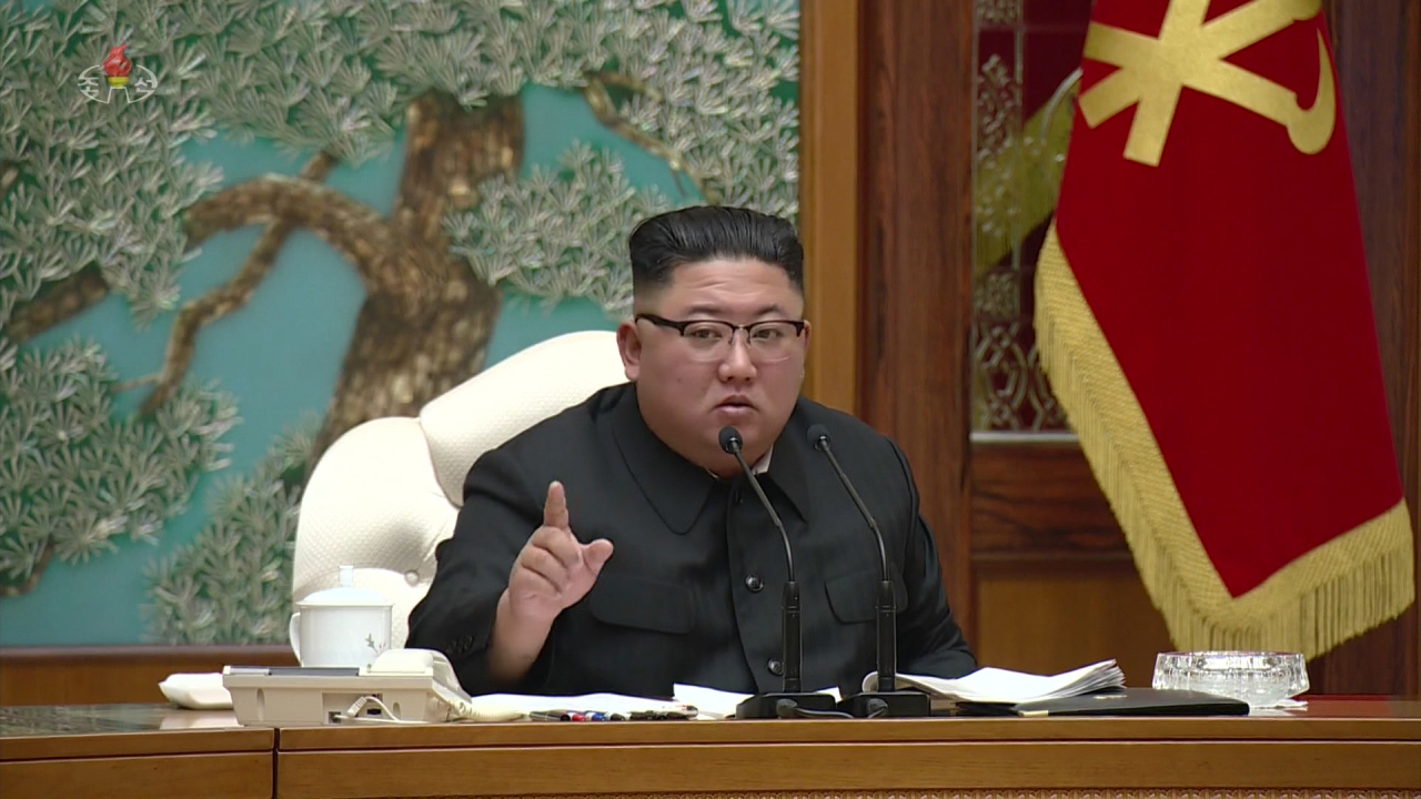 North Korean leader Kim Jong-un presides over a politburo meeting of the ruling Workers’ Party on Sunday. (KCNA-Yonhap)