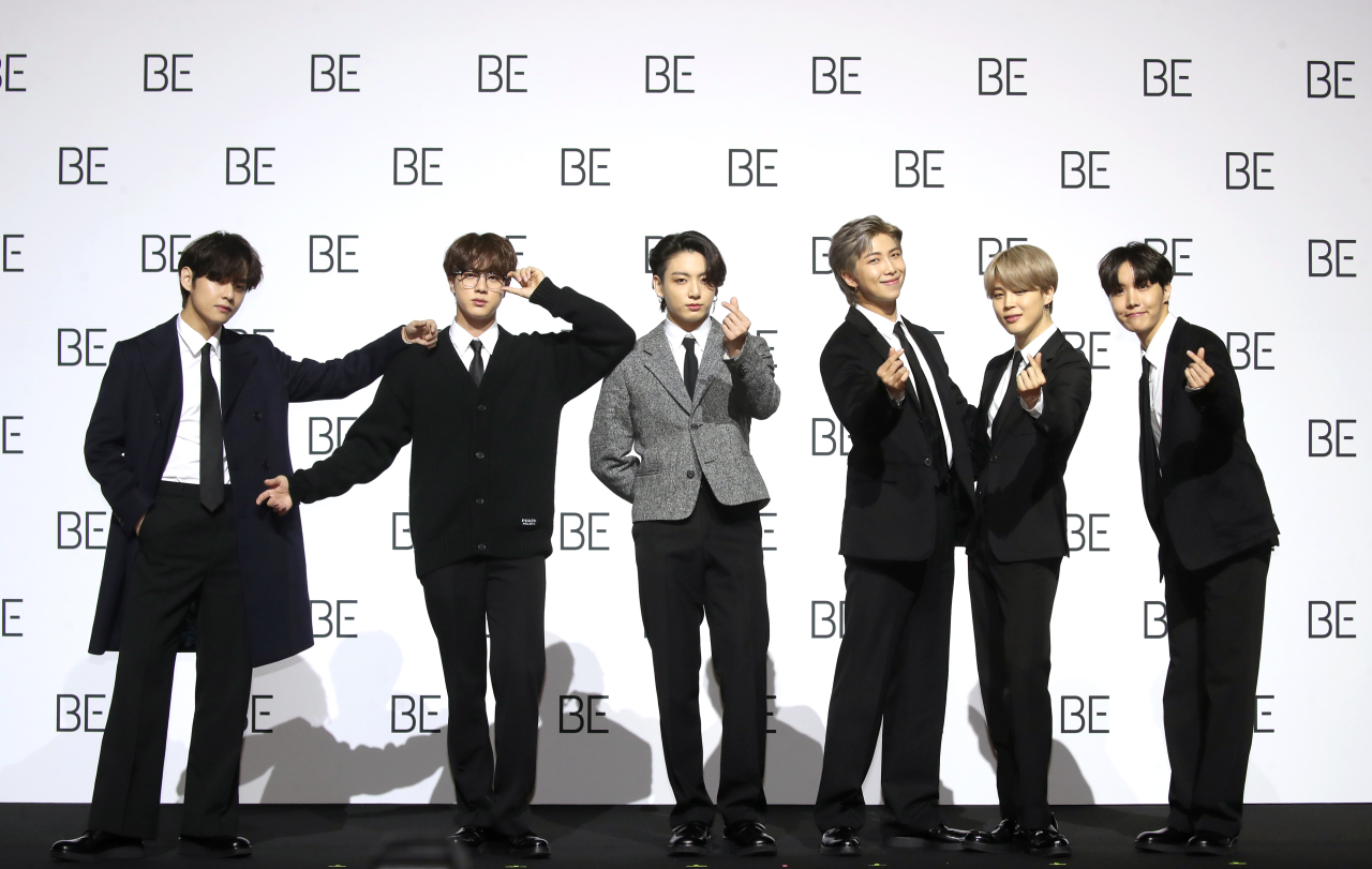 Members of K-pop megastar BTS pose for a photo shoot ahead of a press conference held at the Dongdaemun Design Plaza in central Seoul on Friday. (Yonhap)