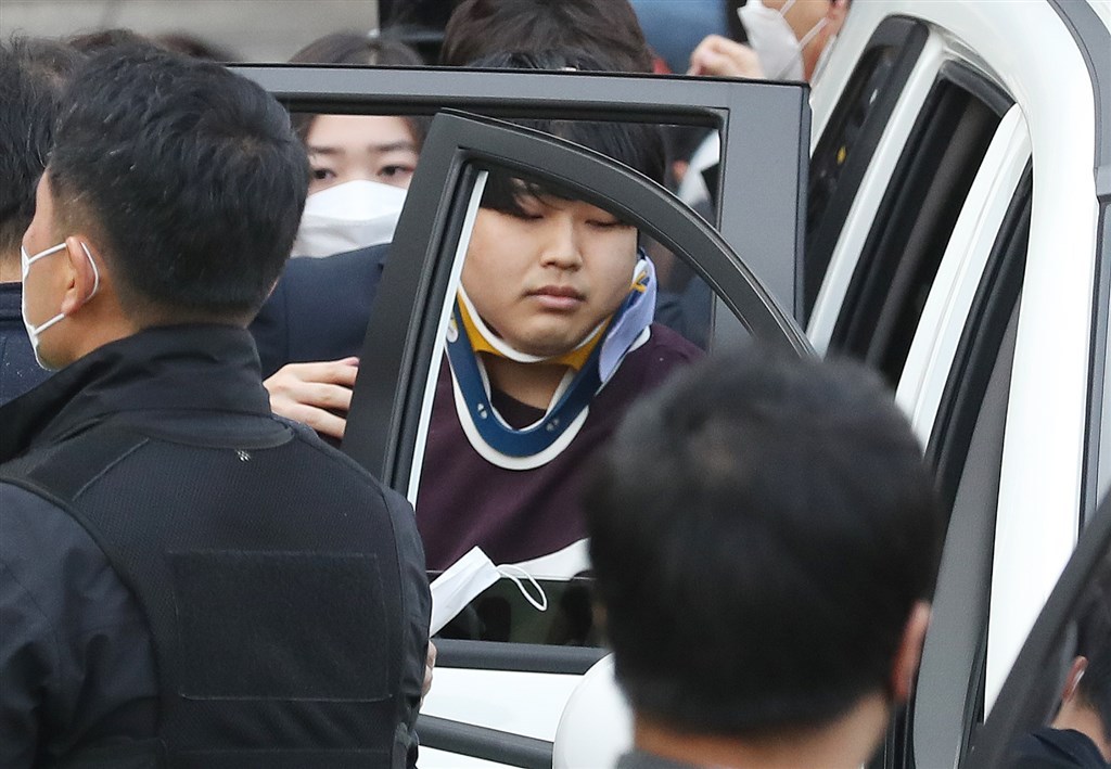 The file photo taken March 25, shows Cho Ju-bin being taken into a car at a police station in Seoul. (Yonhap)