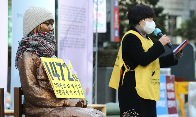 An activist speaks during a weekly protest over Japan‘s forced sexual slavery during World War II, in Seoul on Dec. 30, 2020. (Yonhap)