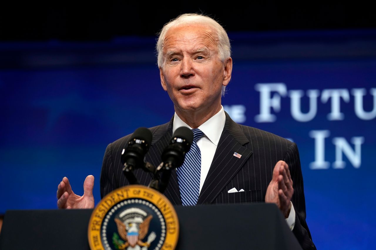 US President Joe Biden speaks in a public address at the White House in Washington on Monday, before signing a 