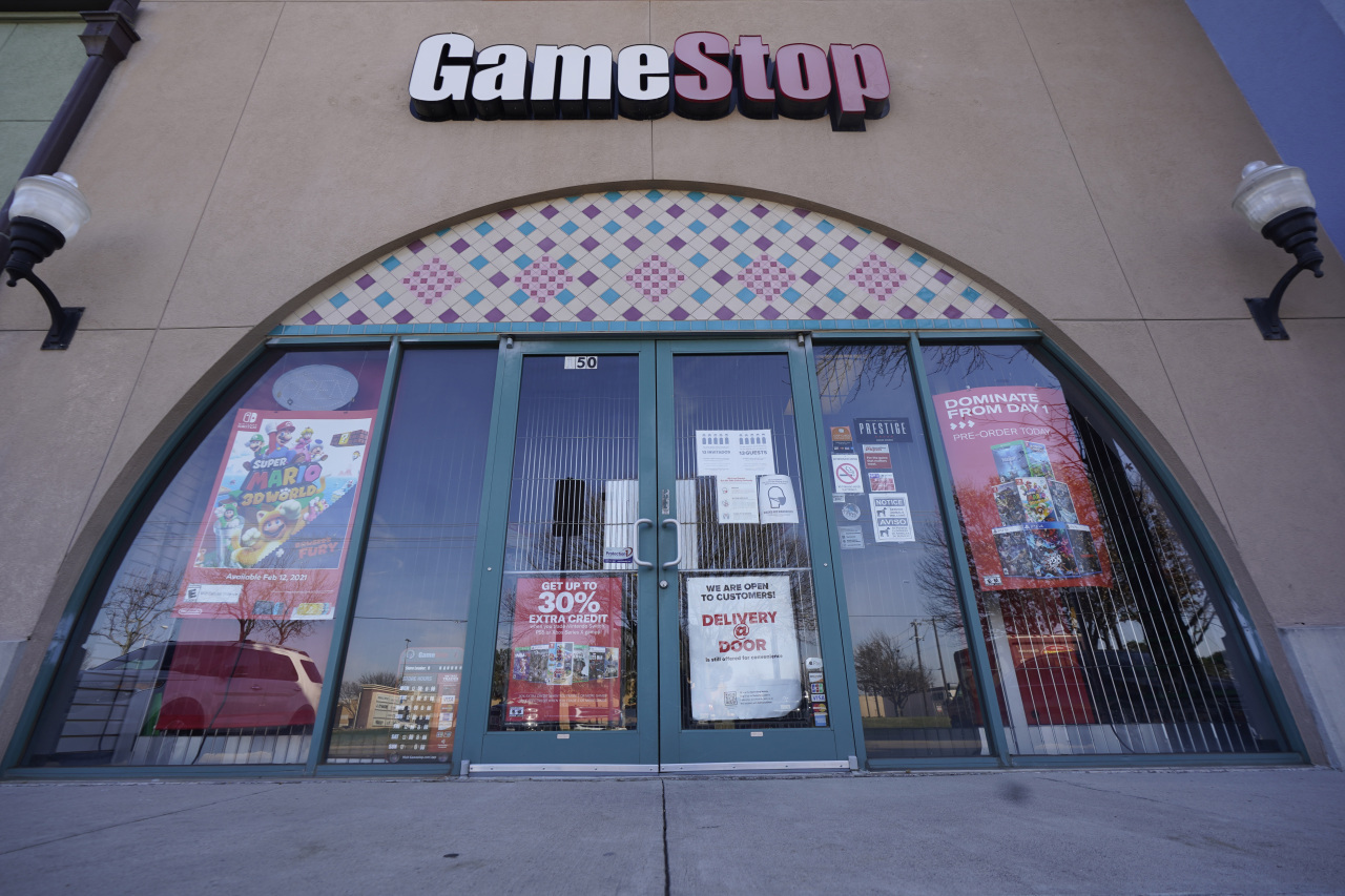 The image shows a GameStop storefront. US Online trading platform Robinhood in January temporarily restricted trading in GameStop and other stocks that have soared recently due to rabid buying by smaller investors. (AP-Yonhap)