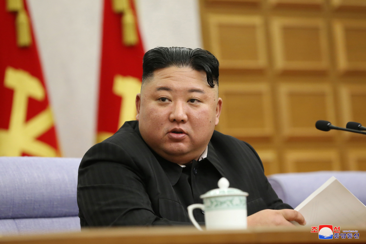 North Korean leader Kim Jong-un presides over the second plenary meeting of the central committee of the Workers' Party in Pyongyang on the event's second day on Tuesday, in this photo released by Korean Central News Agency. The meeting discussed details to put into practice a new five-year economic development plan set forth at the party's eighth congress the previous month, and presented this year's goals. (KCNA-Yonhap)