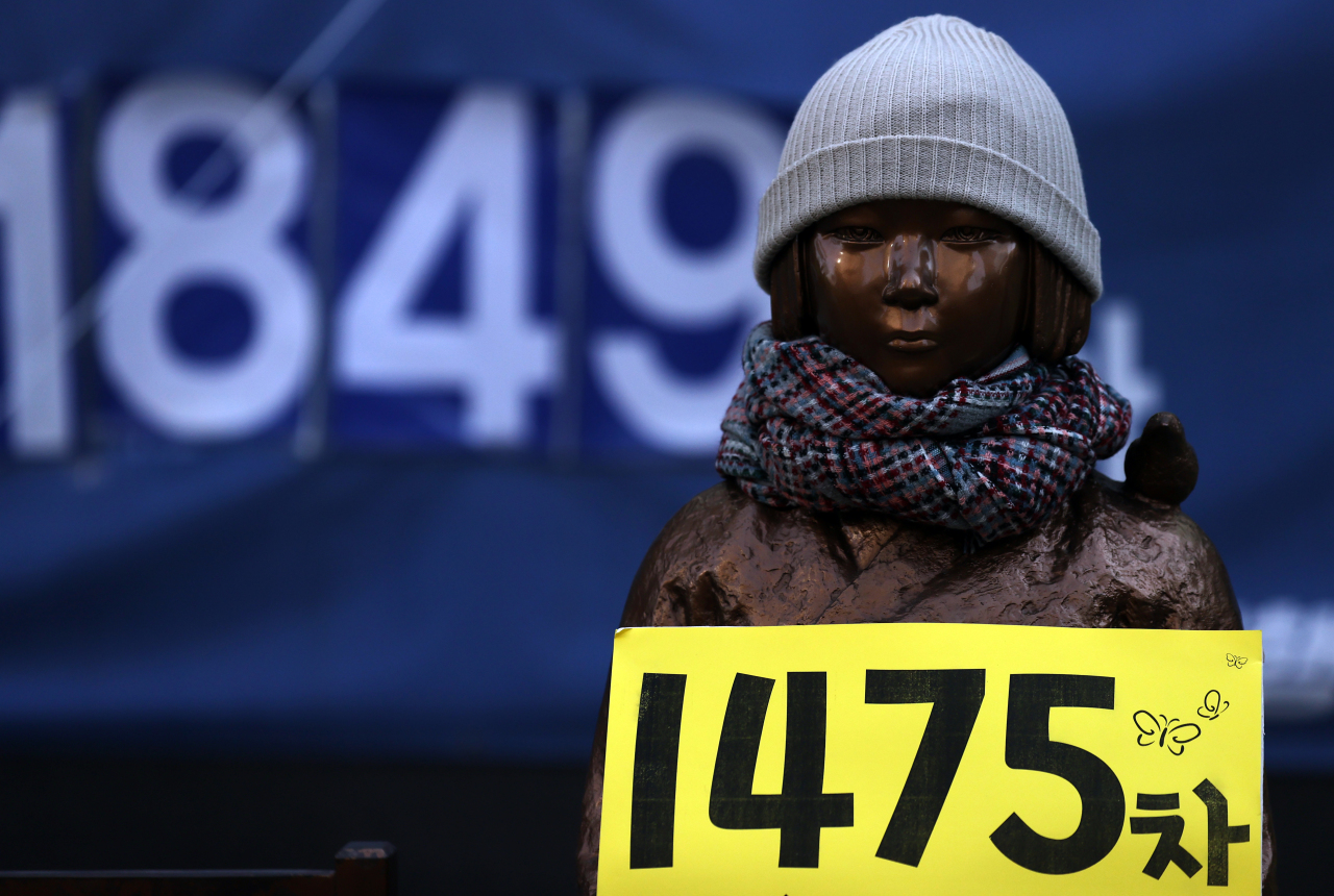 This photo, taken on Jan. 20, 2021, shows a statue symbolyzing victims of Japan's wartime sexual slavery in front of the Japanese Embassy in Seoul. (Yonhap)