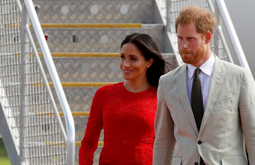 Britain's Prince Harry and Meghan, Duchess of Sussex, arrive at Fua'amotu airport on the main island Tongatapu in Tonga October 25, 2018. (Reuters-Yonhap)