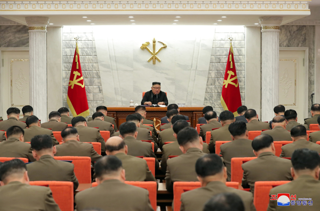North Korean leader Kim Jong-un attends an expanded meeting of the Central Military Commission of the ruling Workers' Party, in this photo released by the North's official Korean Central News Agency on Thursday. (KCNA-Yonhap)