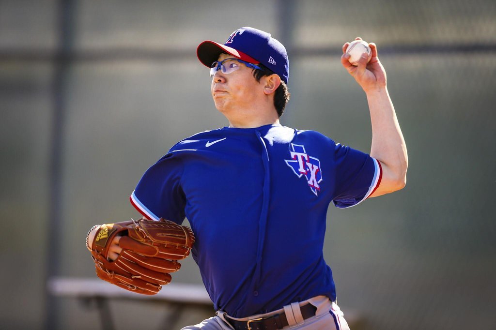 This photo provided by the Texas Rangers on Feb. 25, 2021, shows the club's South Korean pitcher, Yang Hyeon-jong, throwing in the bullpen at Surprise Stadium in Surprise, Arizona. (Texas Rangers)