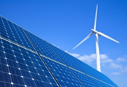 A visual concept image of a solar panel and a wind turbine. (123rf)