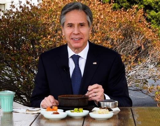 This photo, captured from US Secretary of State Antony Blinken's Twitter account, shows the top US diplomat enjoying Korean tofu stew in Seoul. (US Secretary of State)