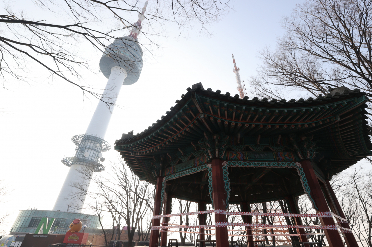Namsan Seoul Tower and a traditional Korean pavilion in Seoul are seen in this photo taken in December 2020. (Yonhap)
