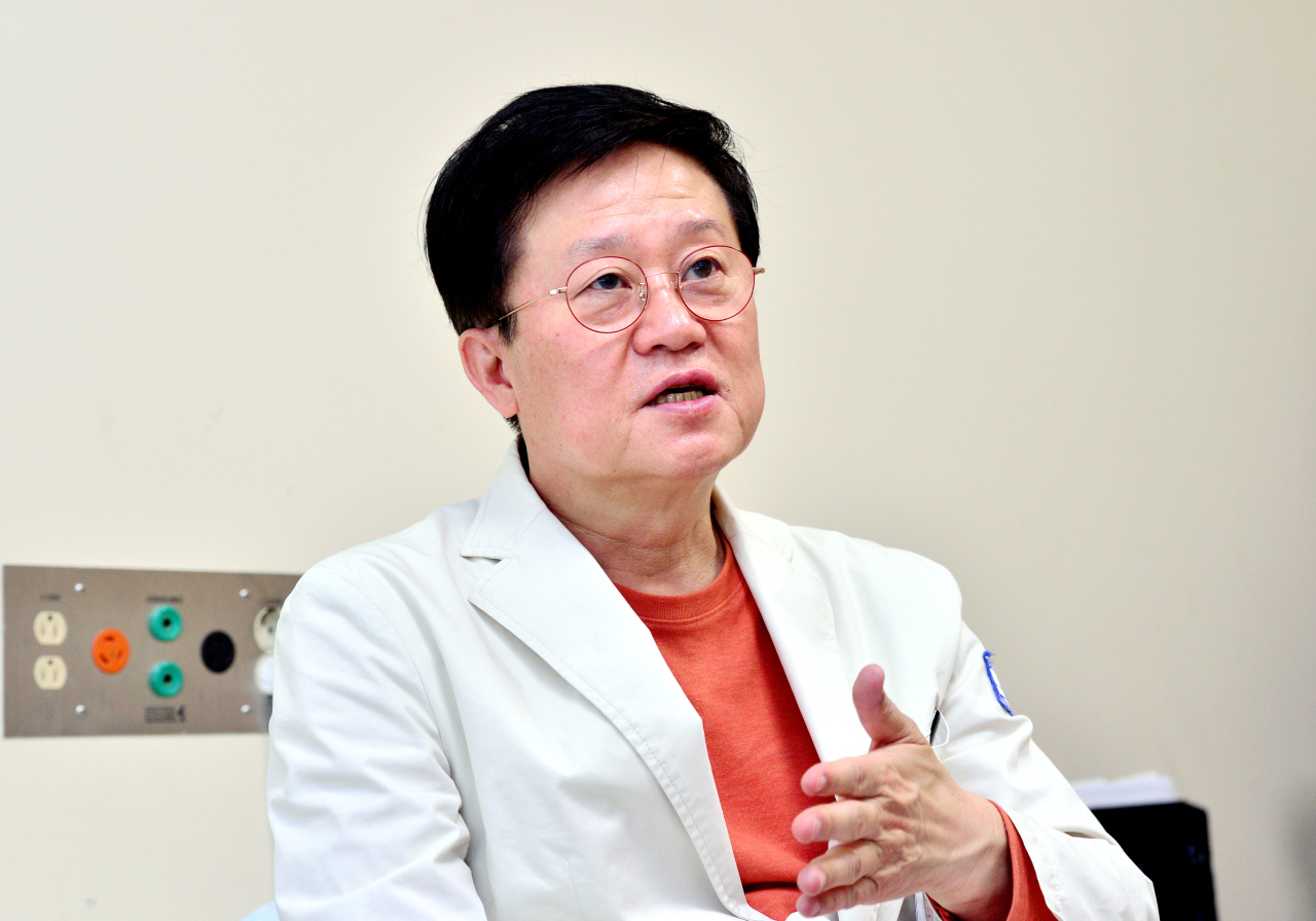 Dr. Kim Dong-wook, president of St. Mary’s Hematology Hospital, speaks to The Korea Herald at his office. (Park Hyun-koo/The Korea Herald)