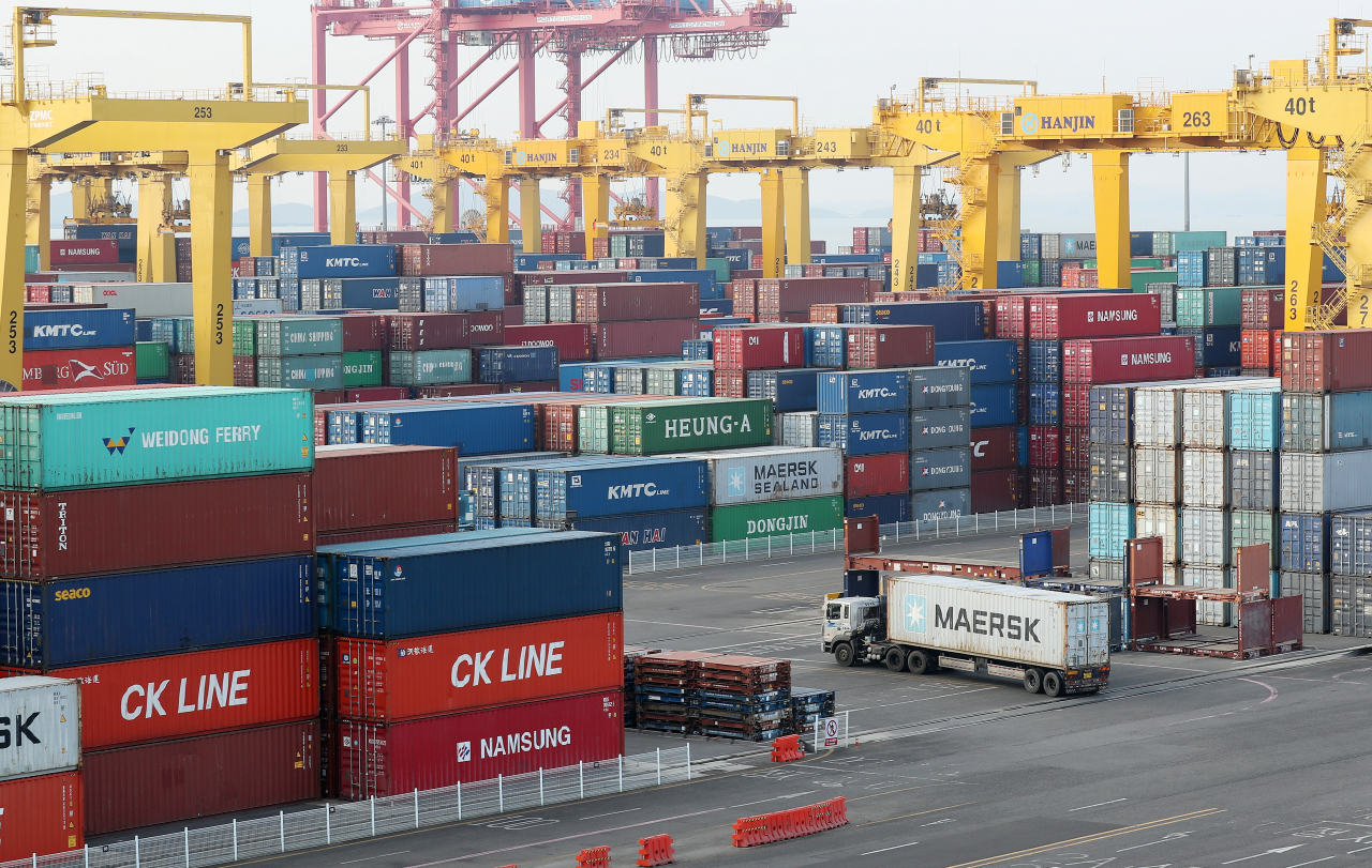 This file photo shows stacks of import-export cargo containers at a port in Incheon, west of Seoul. (Yonhap)