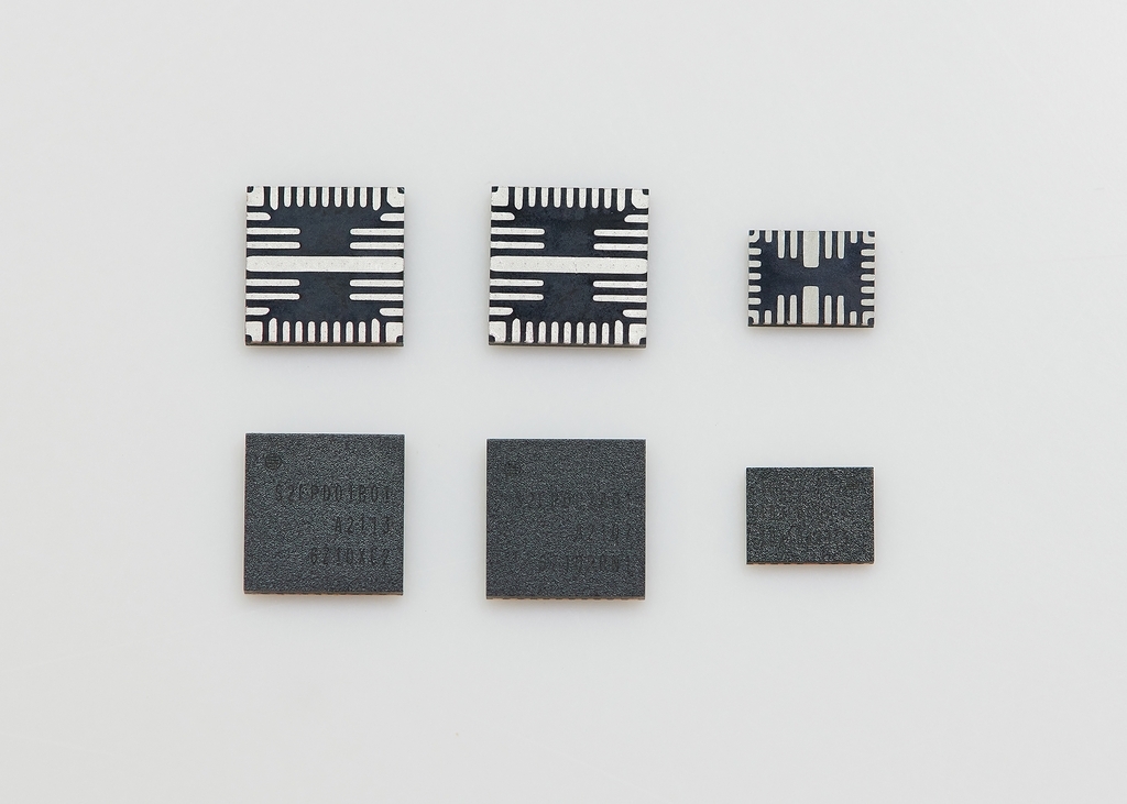 This photo provided by Samsung Electronics Co. on Tuesday, shows the company's new power management integrated circuits for DDR5 DRAM modules. (Samsung Electronics Co.)