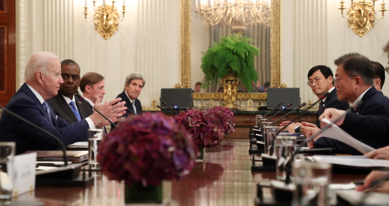 Presidents Moon Jae-in and Joe Biden hold summit talks at the White House in Washington on Friday. (Yonhap)