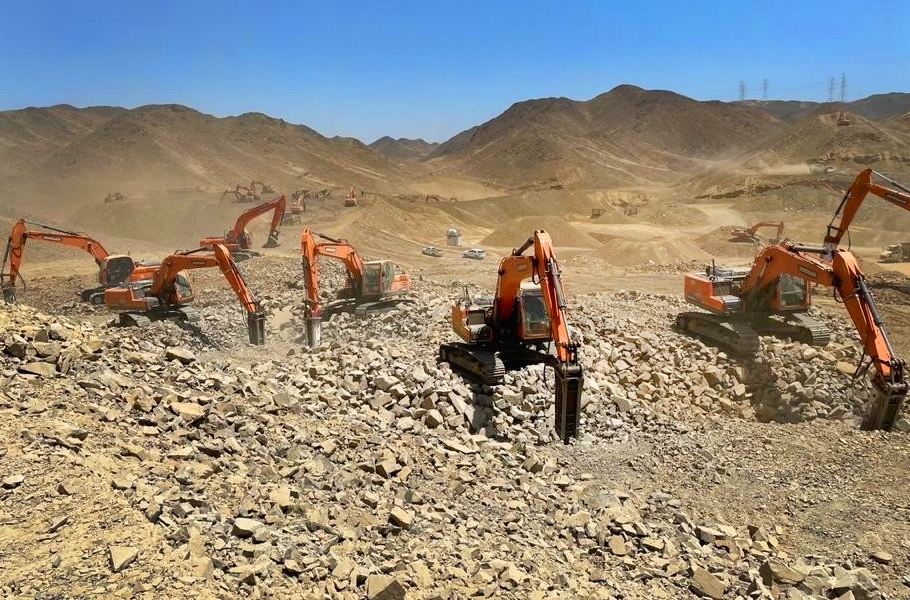 This photo provided by Doosan Infracore Co. on Wednesday, shows the company's excavators at the construction site of Neom City being built in western Saudi Arabia. (Doosan Infracore Co.)