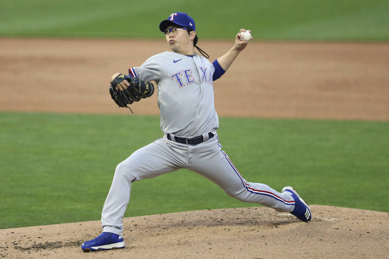 In this Associated Press photo, Yang Hyeon-jong of the Texas Rangers pitches in the bottom of the first inning of a Major League Baseball regular season game against the Minnesota Twins at Target Field in Minneapolis last Wednesday. (AP-Yonhap)