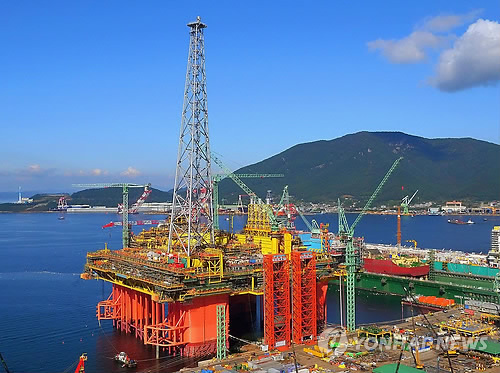 This file photo provided by Samsung Heavy Industries Co. shows an offshore plant being built by the shipbuilder. (Samsung Heavy Industries Co.)