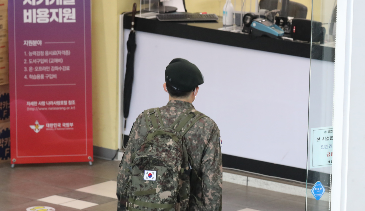 This file photo, taken on May 23, 2021, shows a service member at Seoul Station. (Yonhap)