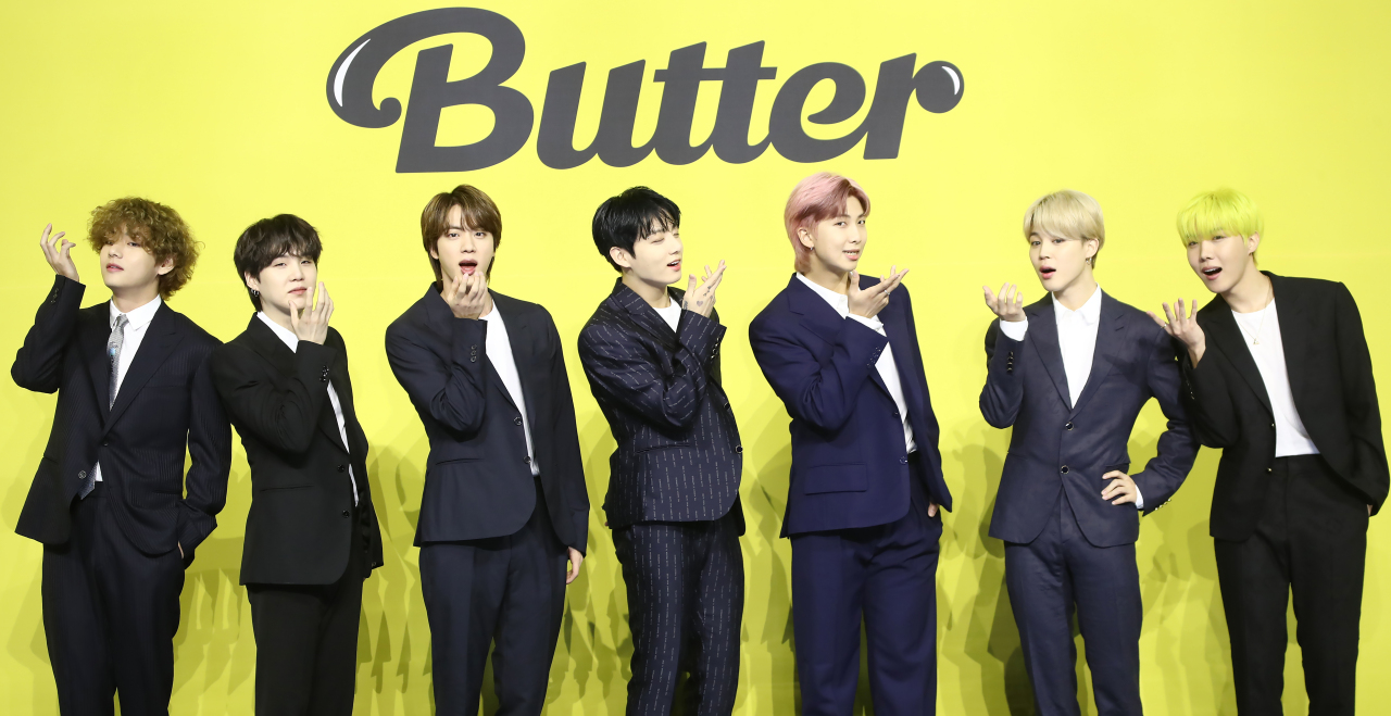 BTS members pose for photo during a press conference held after releasing new digital single “Butter” on May 21. (Yonhap)