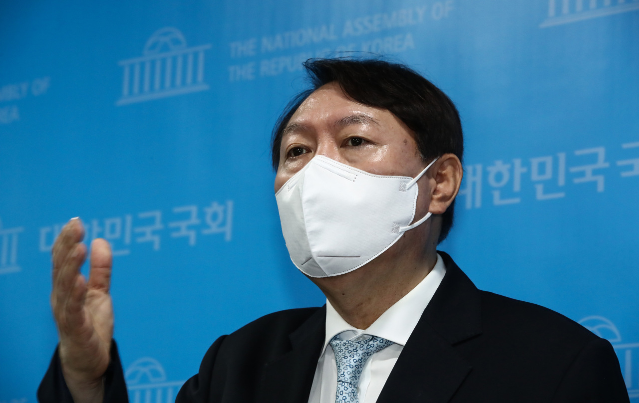 Ex-Prosecutor General Yoon Seok-youl responds to a media question at the National Assembly in Seoul on Wednesday. (Yonhap)