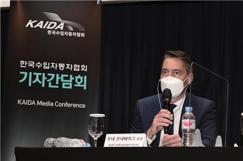 This photo taken on July 6, 2021, and provided by KAIDA shows the association's Chairman Rene Koneberg answering questions from reporters during a press conference held at Hilton Hotel in Seoul. (KAIDA)