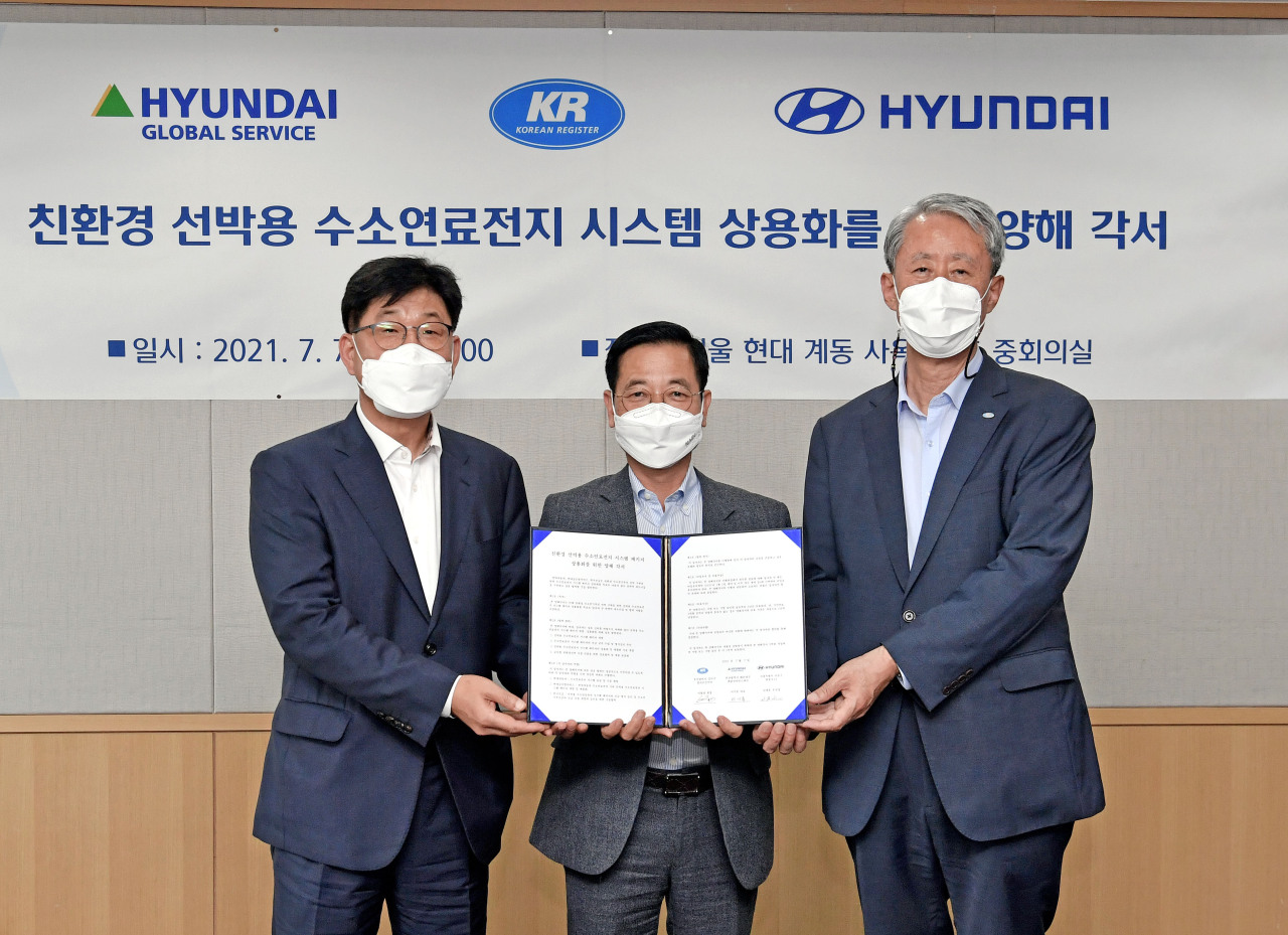 Officials from Hyundai Motor, Hyundai Global Service and the Korean Register of Shipping pose at a signing ceremony for joint development and commercialization of hydrogen fuel cell systems for ships at Hyundai Heavy Industries Group headquarter on Wednesday. (Hyundai Motor)