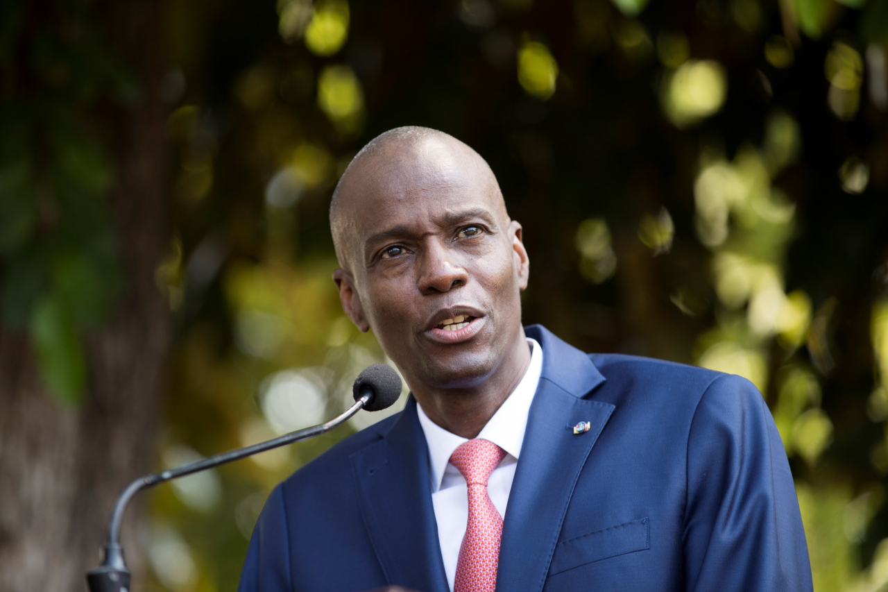 Haitian President Jovenel Moise speaks to the press in the gardens of the National Palace in Port-au-Prince, Haiti, Oct. 15, 2019. (Yonhap)