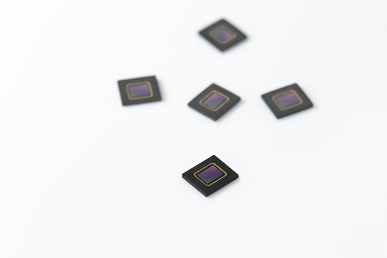 This photo provided by Samsung Electronics Co. on Tuesday, shows the company's ISOCELL Auto 4AC automotive image sensor. (Samsung Electronics Co.)