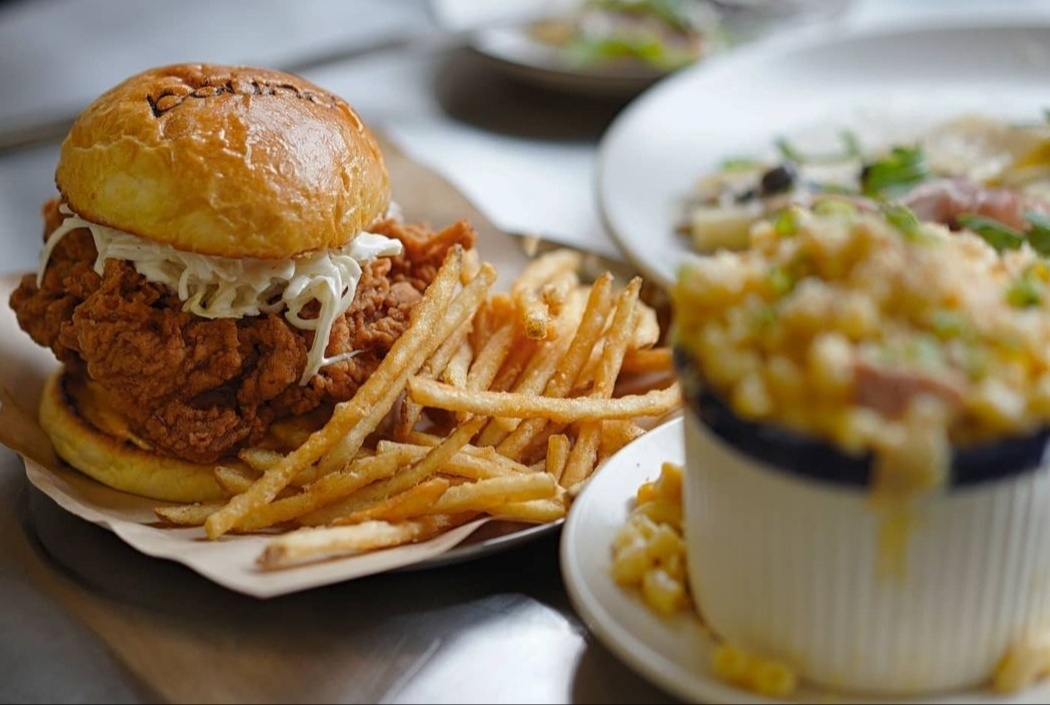 Pound’s boneless fried chicken thigh is so huge that it sort of drapes over the edges of its bun. (poundseoul)