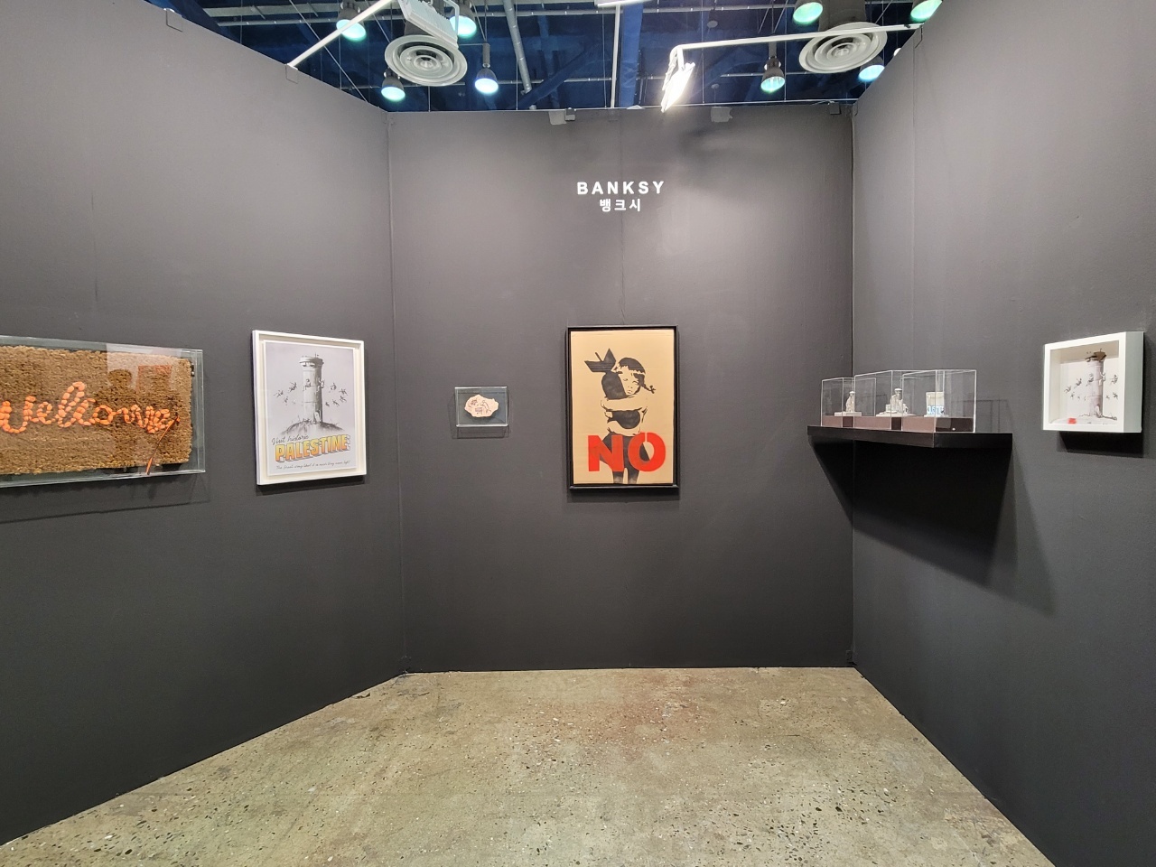 Banksy artworks are on display at the Galerie Brugier-Rigail’s booth at 2021 Urban Break (Park Yuna/The Korea Herald)