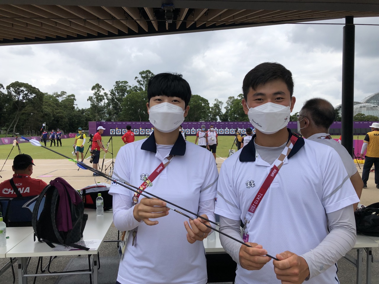 South Korean archers An San (L) and Kim Je-deok pose with their 