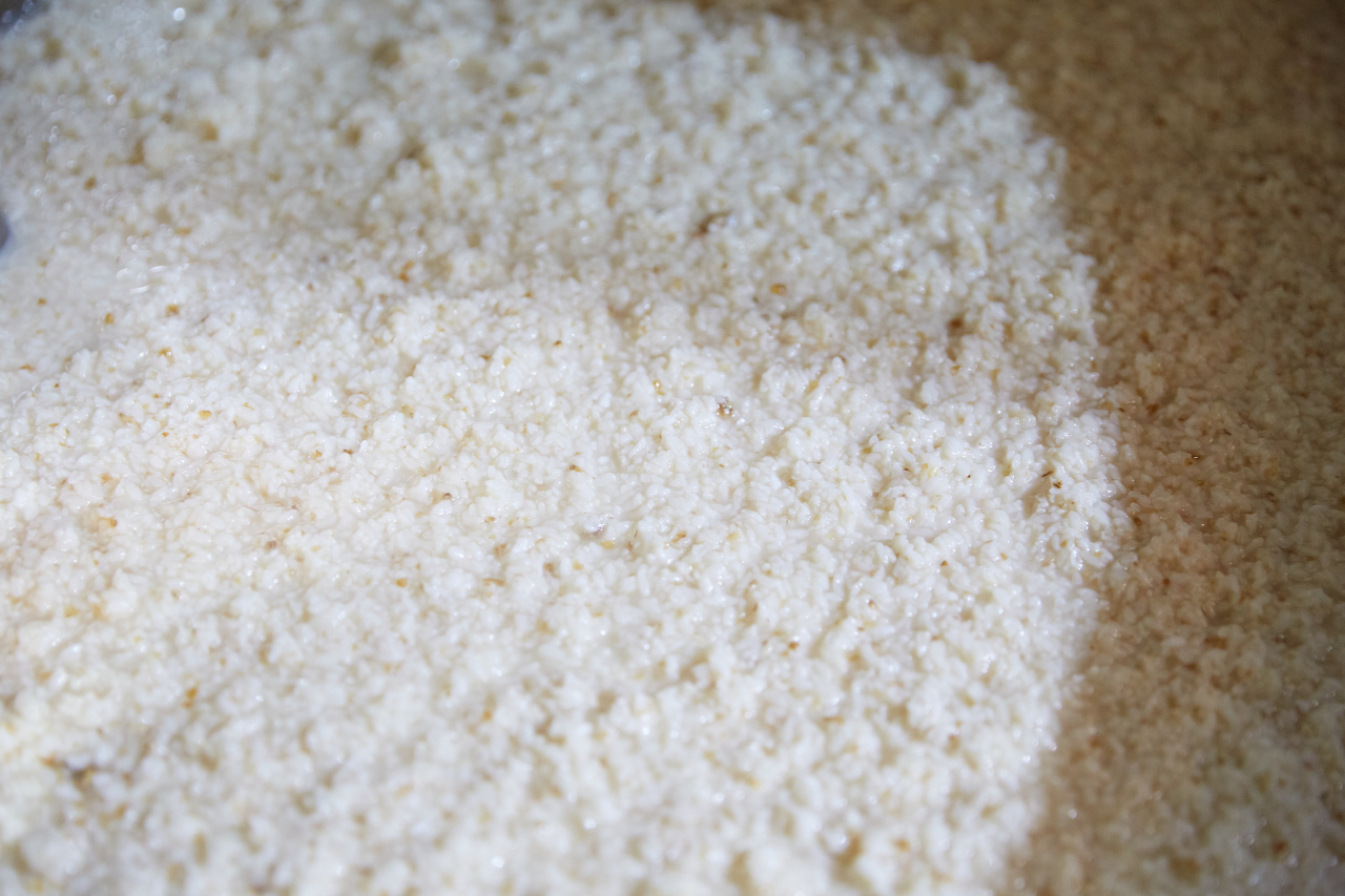 Rice undergoing the fermentation process at a local brewery (OneshotKorea)