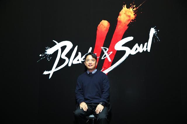 NCSoft CEO Kim Taek-jin introduces the firm’s new game Blade & Soul 2 at a media showcase held in February. (NCSoft)