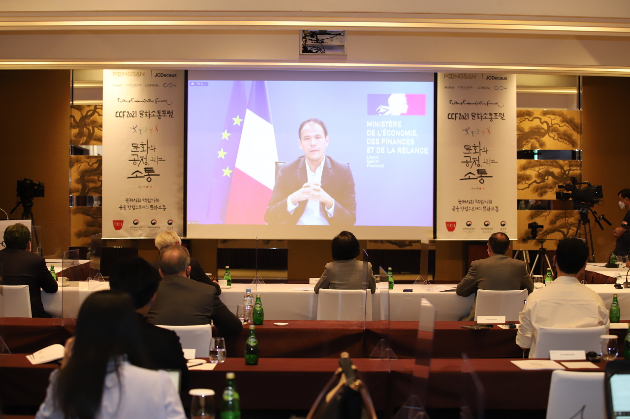 French Secretary of State for Digital Transition and Electronic Communications Cedric O delivers his congratulatory remarks online, Tuesday. (CICI)