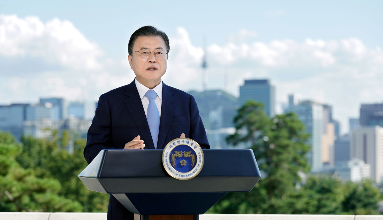 In this photo provided by Cheong Wa Dae on Tuesday, President Moon Jae-in delivers a speech to mark the second UN-designated International Day of Clean Air for blue skies. (Cheong Wa Dae)