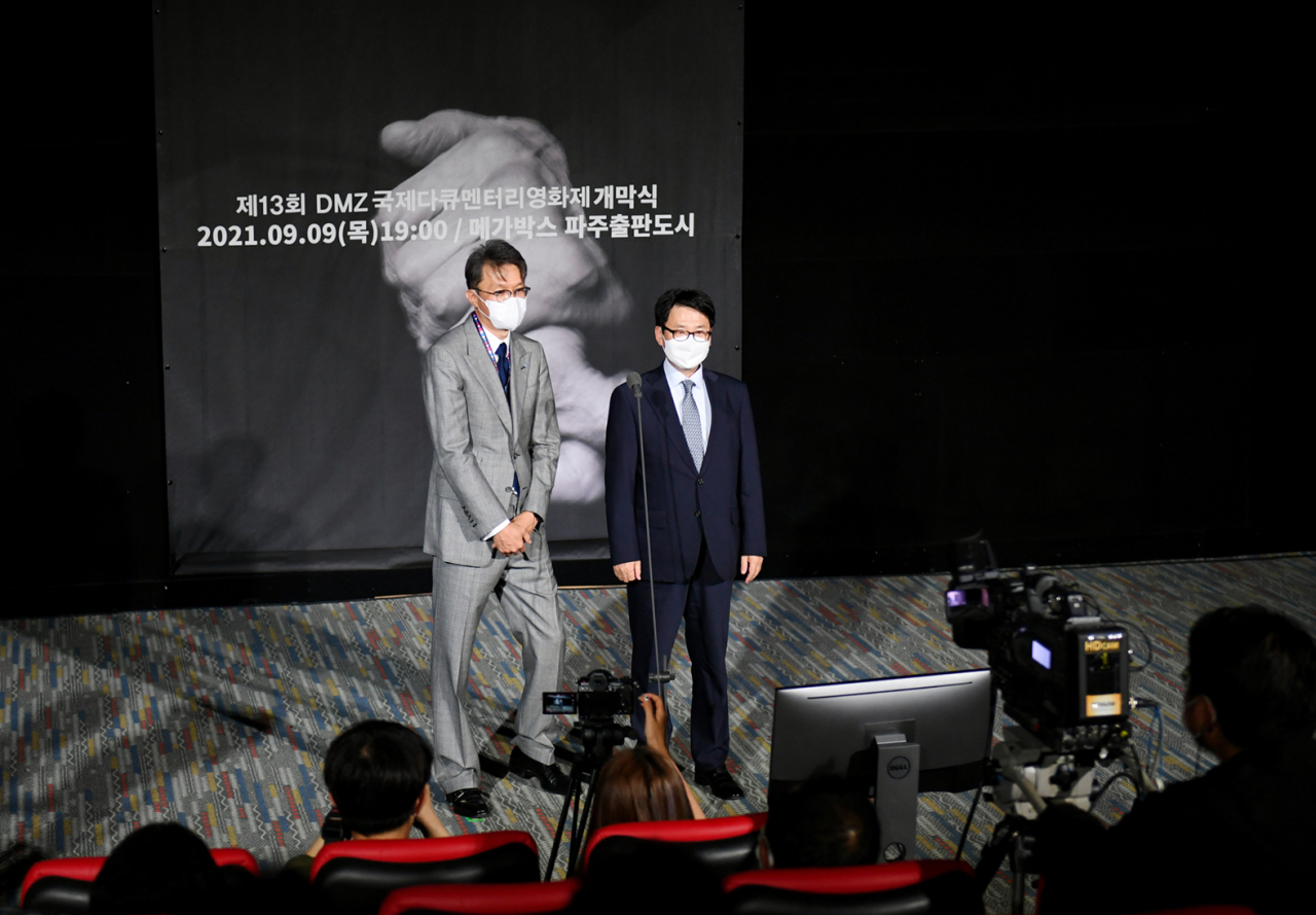 Festival director Jung Sang-jin (left) and Paju Mayor Choi Jong-hwan announce the opening of DMZ Docs Thursday at Megabox Paju Bookcity in Paju, Gyeonggi Province. (Paju City)