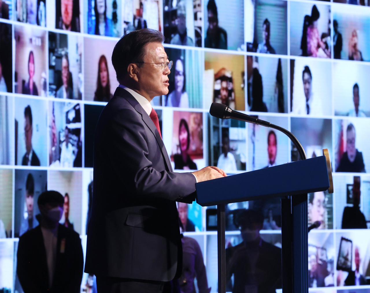 President Moon Jae-in delivers a speech commemorating the 15th World Korean Day at the Grand Walkerhill Hotel in Seoul on Tuesday. (Yonhap)