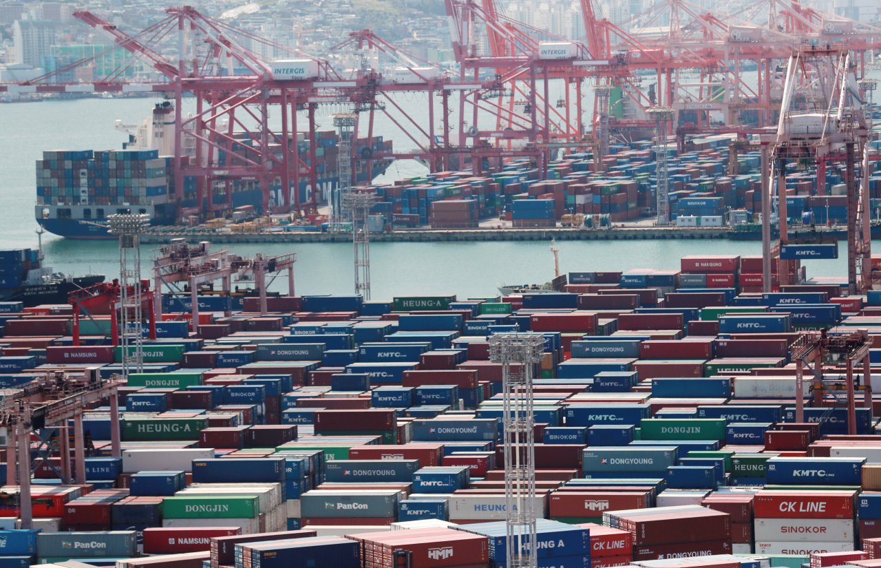 This file photo, taken Oct. 1, 2021, shows stacks of containers at a port in South Korea's southeastern city of Busan. (Yonhap)