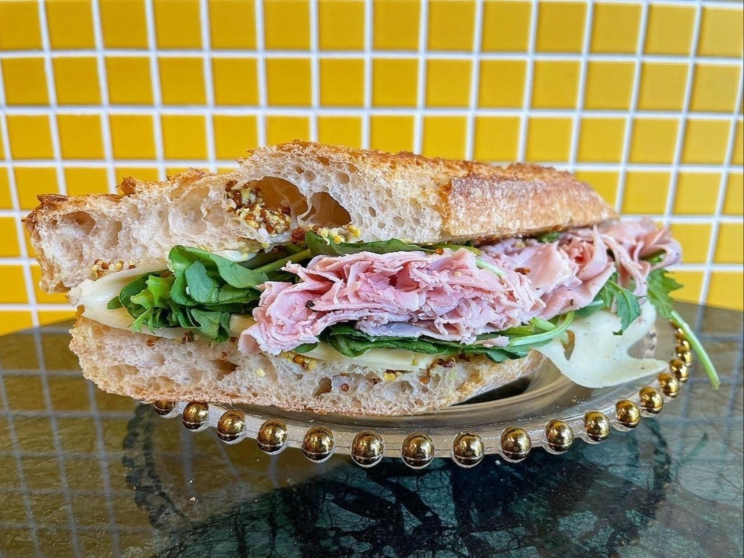 Levain Rules’ rucola fromage jambon-beurre features ham, rucola, Gouda cheese, wholegrain mustard and, of course, butter. (Photo credit: Levain Rules)