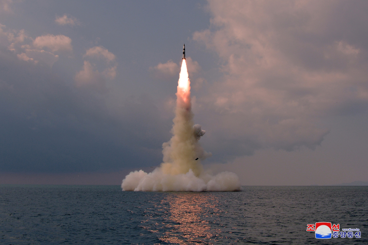 This photo, released by North Korea's official Korean Central News Agency (KCNA) on Wednesday, shows a submarine-launched ballistic missile (SLBM) being fired in waters off the east coast the previous day. (Korean Central News Agency (KCNA))