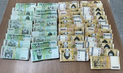 This photo shows cash seized from sex trafficking suspects. (Busan Metropolitan Police)