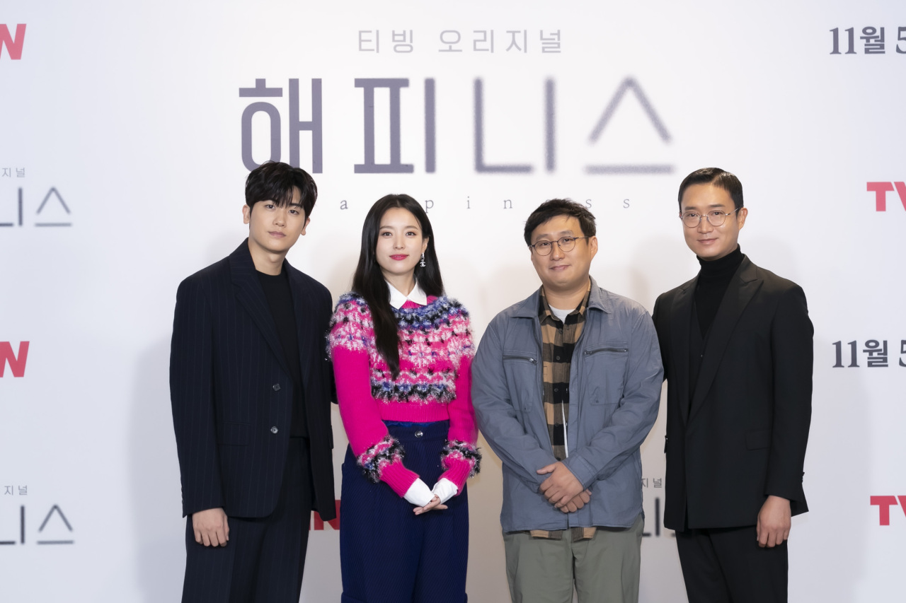 From left: Actors Park Hyung-sik, Han Hyo-joo, director Ahn Gil-ho and actor Jo Woo-jin pose for photos after an online press conference Monday (tvN)