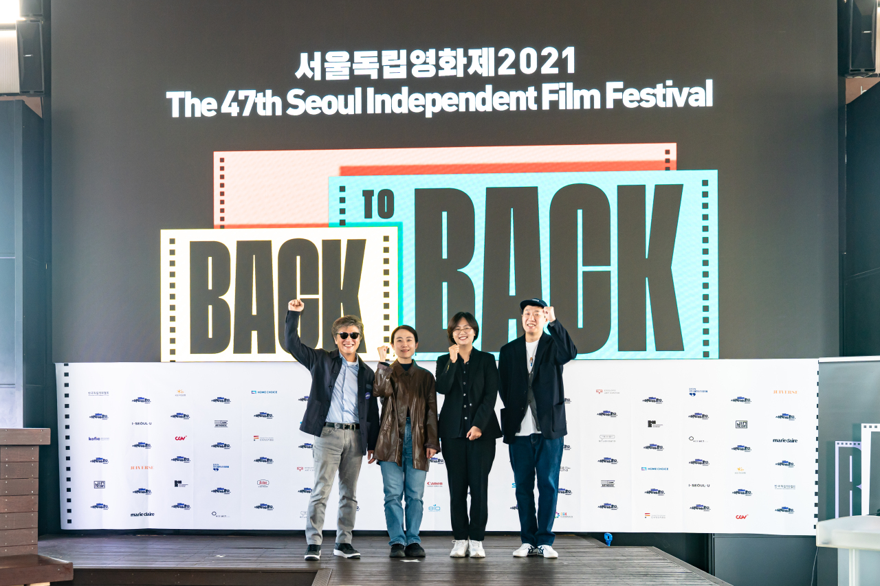 From left: Actor Kwon Hye-hyo, the 47th Seoul Independent Film Festival selection judge Jung Ji-hye, SIFF director Kim Dong-hyun film director Han Jun-hee pose after a press conference held at Megabox Artnine theater in Dongjak-gu, Seoul. (SIFF)