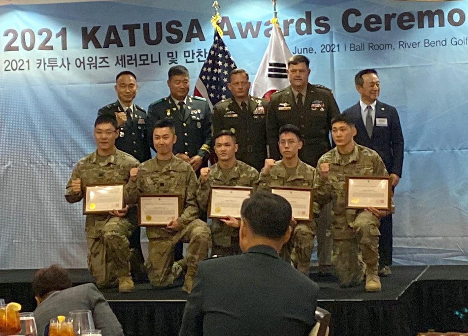 Sgt. Baik, In-chul, center kneeling, is one of five Republic of Korea soldiers to be recognized with a Best KATUSA Warrior award during an event at US Army Garrison Humphreys, South Korea, on June 16, 2021. (US Army Medical Logistics Command/Disclaimer: The appearance of US Department of Defense (DoD) visual information does not imply or constitute DoD endorsement)