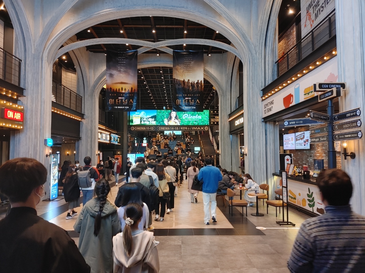 Moviegoers line up for a late-night screening at CGV Yongsan in central Seoul on Wednesday. (Lee Si-jin/The Korea Herald)