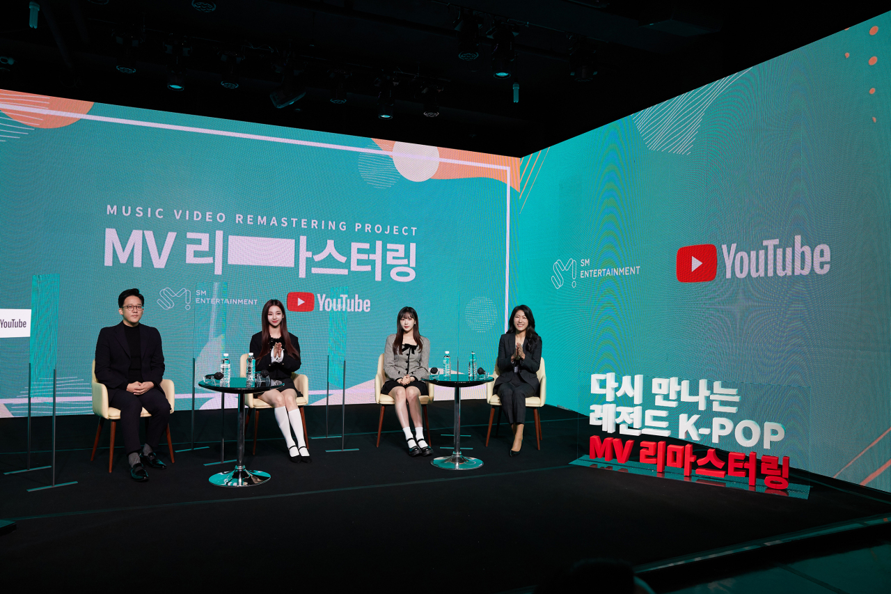 (L to R) Lee Sung-soo, CEO of SM Entertainment, aespa members Karina and Giselle, and Lee Sun, Head of Music Partnerships of YouTube in Greater China and Korea, attend the press conference 