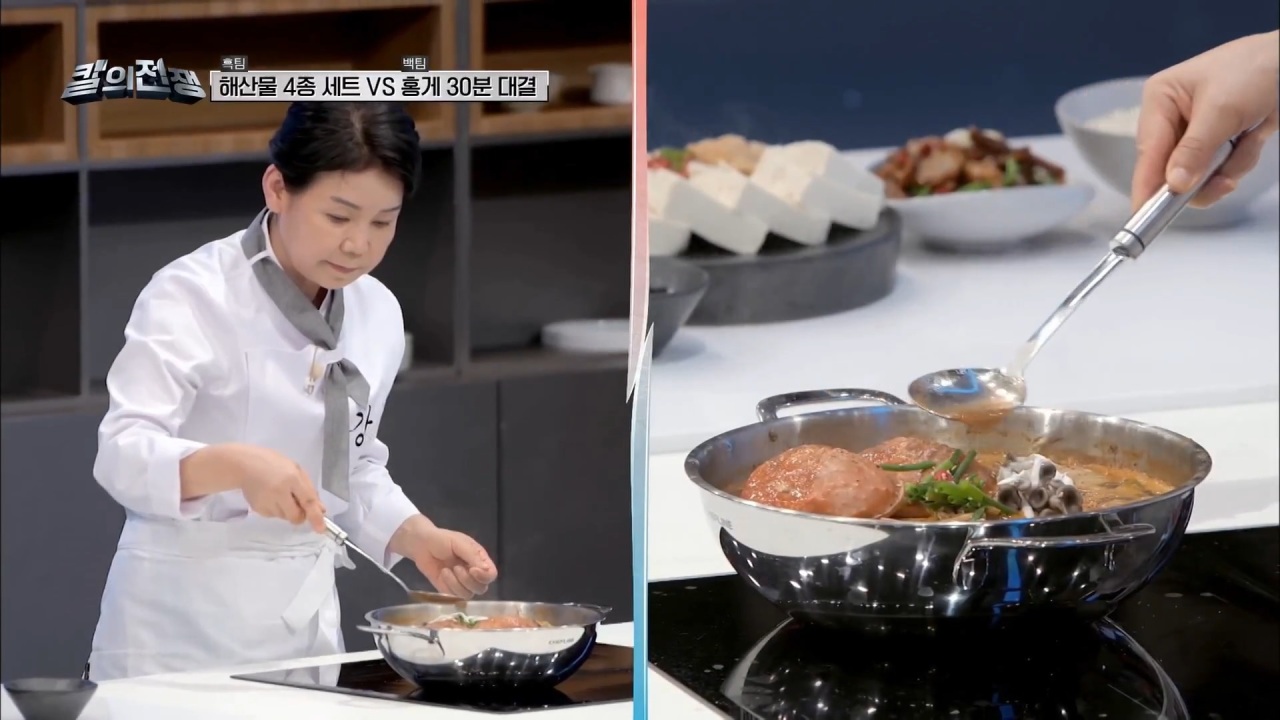 Screenshot from a highlight video for “The War of Chefs” shows a chef representing Gangwon Province preparing her dish. (tvN Story)