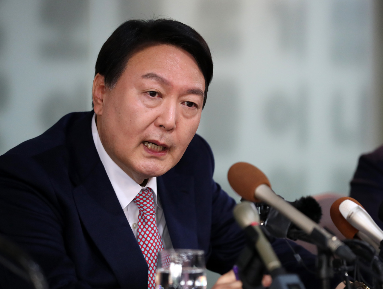 Former Prosecutor General Yoon Seok-youl, presidential nominee for the main opposition People Power Party, speaks Friday during a press conference held in Jung-gu, central Seoul. (Joint Press Corps)