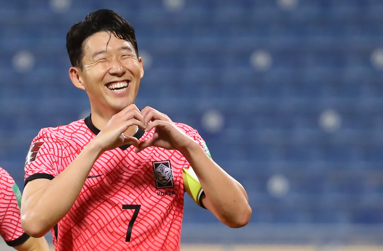 Son Heung-min of South Korea celebrates his goal against Iraq during the teams' Group A match in the final Asian qualifying round for the 2022 FIFA World Cup at Thani bin Jassim Stadium in Doha on Tuesday. (Yonhap)
